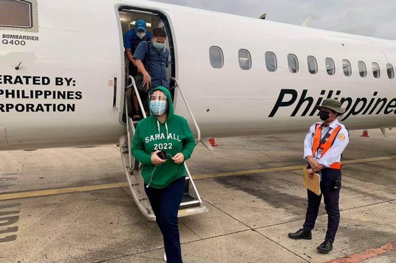 Sara Duterte in green, Bongbong Marcos in red as they visit Cebu
