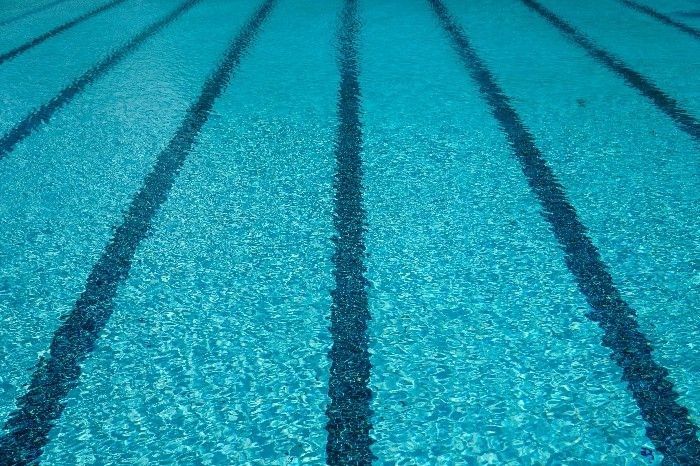 Dela Cruz sets new swim mark