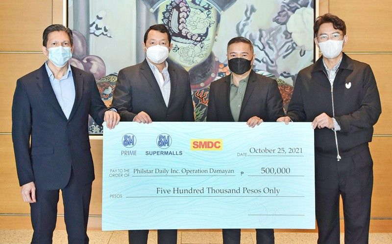 SM employees donate Christmas party fund to charities