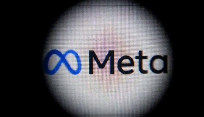This photograph taken on October 28, 2021 shows the META logo on a laptop screen in Moscow as Facebook chief Mark Zuckerberg announced the parent company's name is being changed to &quot;Meta&quot; to represent a future beyond just its troubled social network. The new handle comes as the social media giant tries to fend off one its worst crises yet and pivot to its ambitions for the &quot;metaverse&quot; virtual reality version of the internet that the tech giant sees as the future.