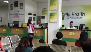 This undated photo shows members lining up for PhilHealth benefits at an unnamed hospital. 