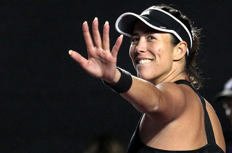 Muguruza reaches semis