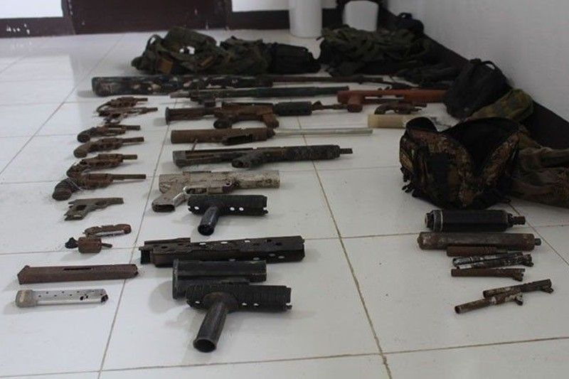 Cops seize firearms, explosives from â��Redsâ��