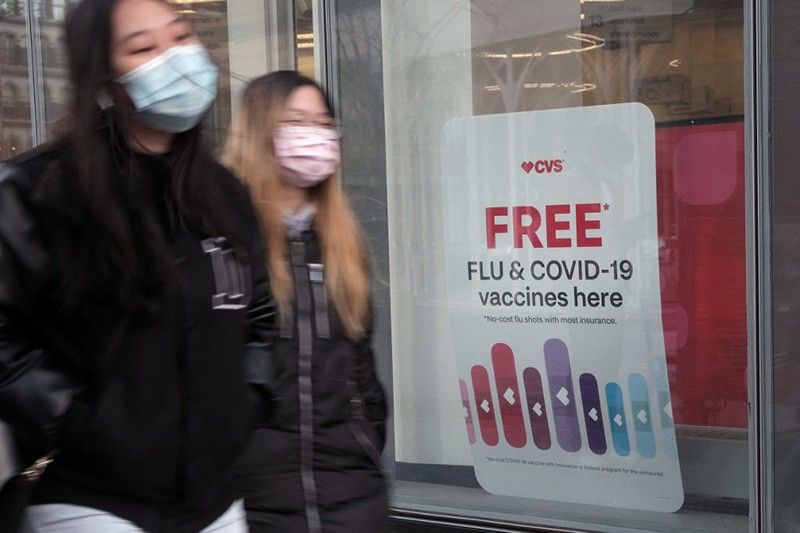 US authorizes COVID-19 boosters for all adults, recommends for over-50s