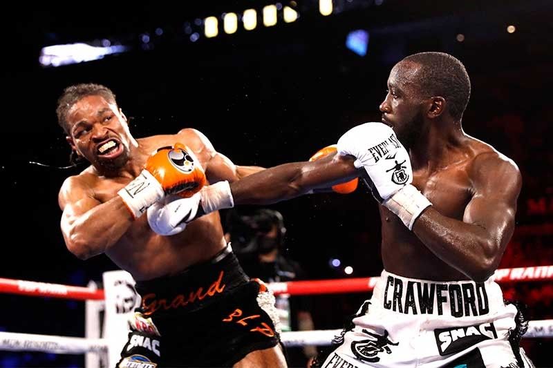 Unbeaten Crawford stops Porter to retain WBO welterweight title ...