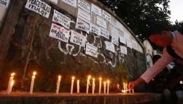 This undated photo shows people lighting candles to protest killings under the Duterte administration's 'war on drugs.' 