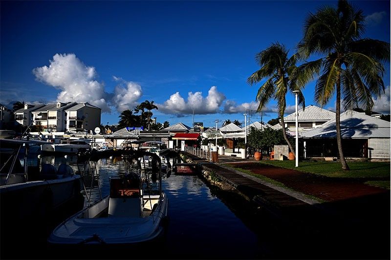 'Explosive' COVID-19 riots paralyze France's Guadeloupe