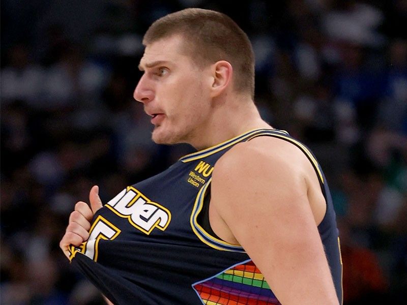 Booed Jokic leads Nuggets past short-handed Heat