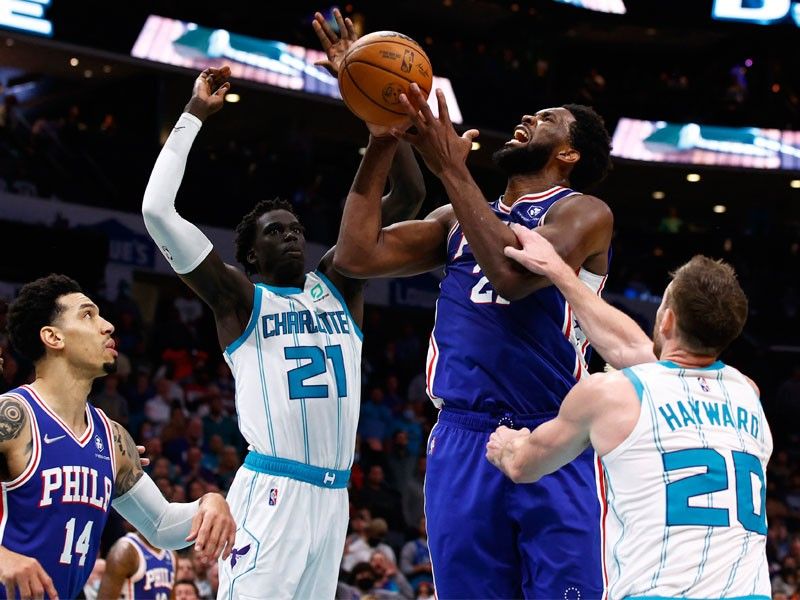 Embiid guides 76ers to win over Hornets in OT
