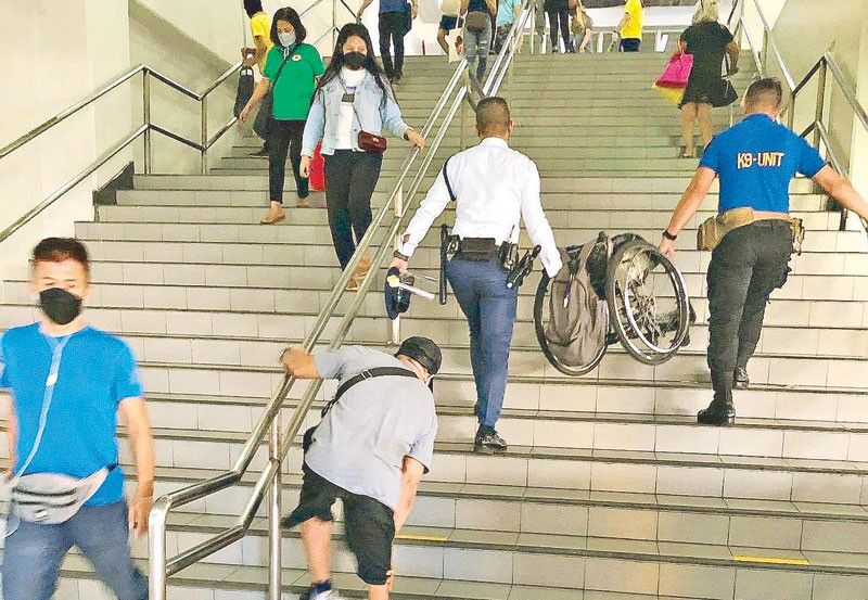 Alarmed over viral photo of PWD climbing stairs, CHR calls for better facilities