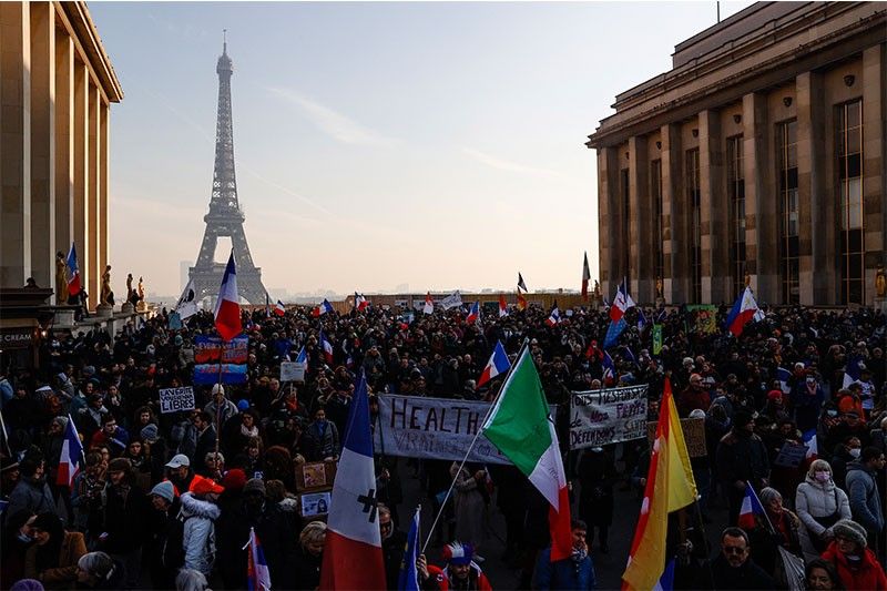 Protesters hit French streets to fight new vaccine pass