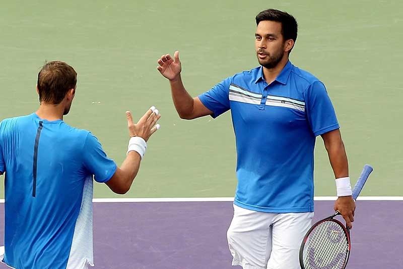 Huey, partner ousted by home bets in Australia Open doubles; Fil-Aussie Cabrera out too