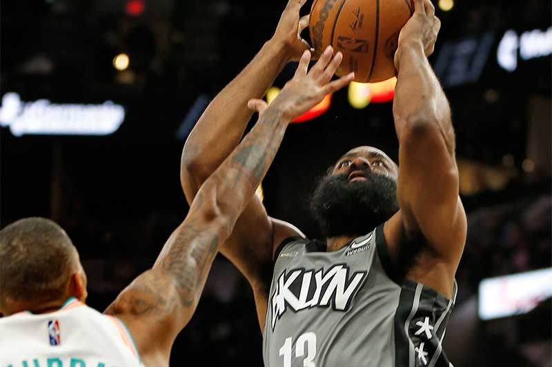 Nets nip Spurs to reclaim East top spot