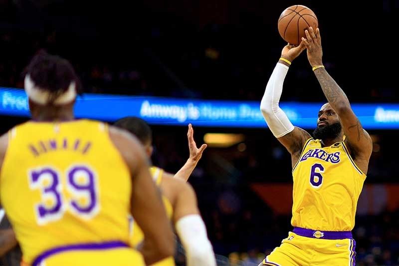 LeBron, Lakers turn back Magic to return to 500