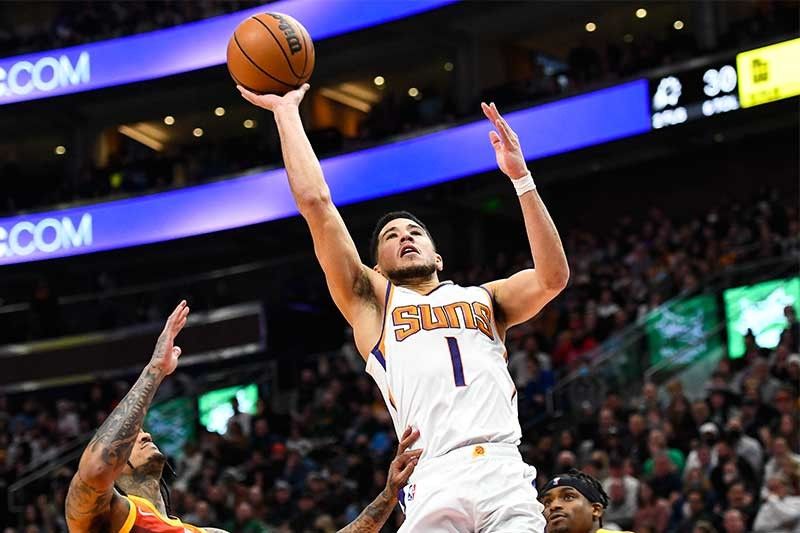 Suns hold off Clarkson, Jazz for 8th straight win