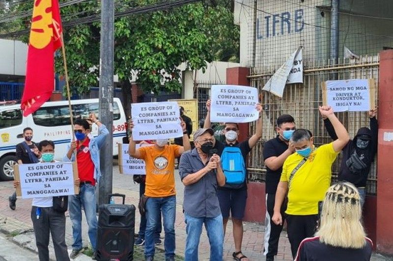 Bus drivers protest delayed P20 million salaries