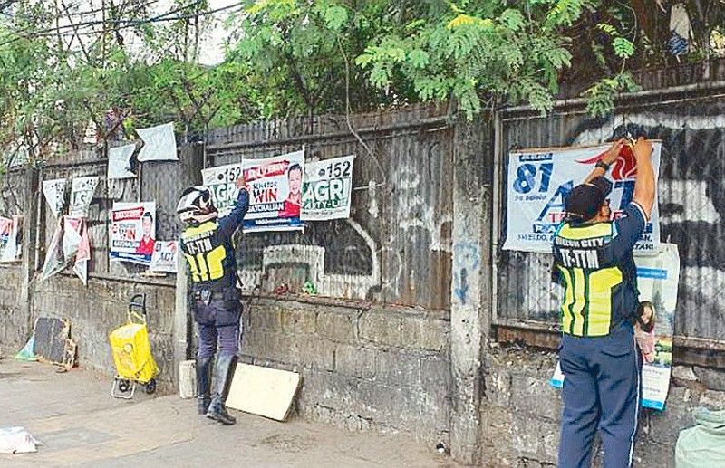 Quezon City takes down unauthorized ads, campaign materials