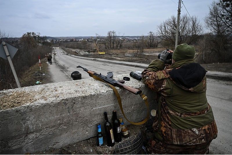 'We will blow it up': Last bridge to Kyiv stalls Russian advance