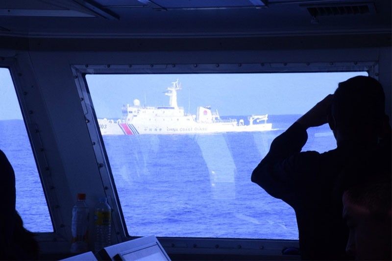 Beijing insists sovereignty over Panatag after near collision of Filipino, Chinese ships