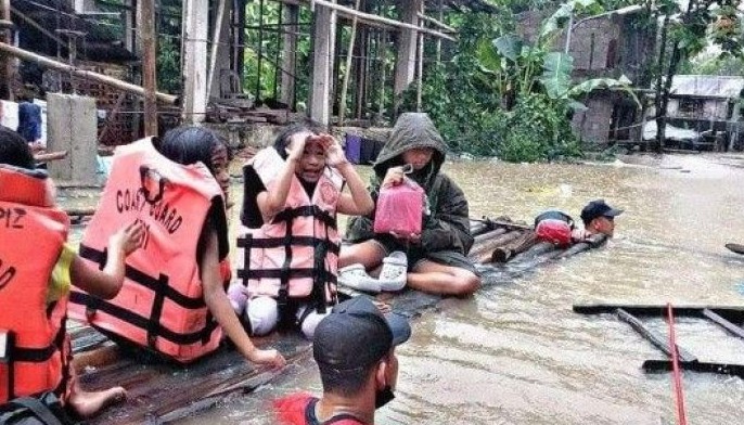 Photo release shows ongoing rescue operations by the Philippine Coast Guard in Panay, Sigma, Maayon, Pilar, and Panitan in the province of Capiz after floods caused by tropical depression Agaton on April 12, 2022.