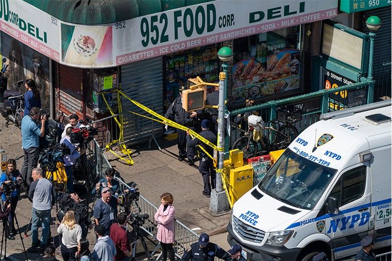 Manhunt after 10 shot in Brooklyn subway attack