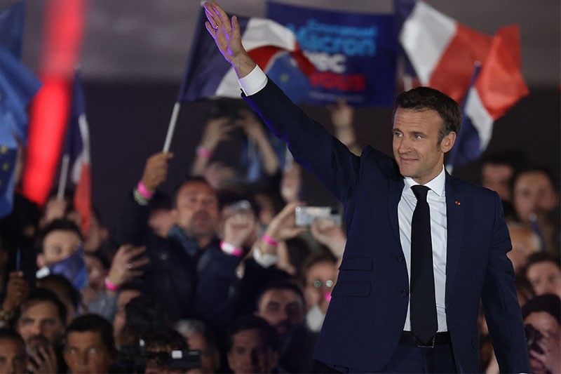 France's Macron wins new term after far-right battle