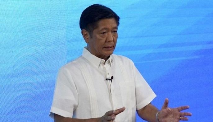 Presidential candidate Ferdinand Marcos Jr. speaks to reporters at the campaign heaquarters in Manila on May 11, 2022. Marcos on May 11 claimed victory in the presidential election, vowing to be a leader &quot;for all Filipinos,&quot; his spokesman said.