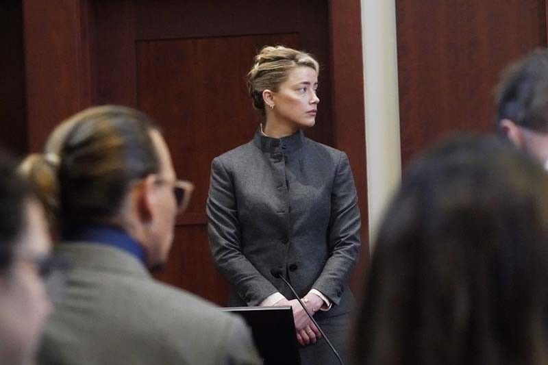 Amber Heard says trial is 'torture,' wants to 'move on'