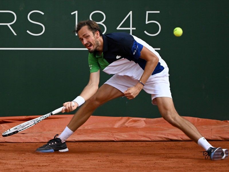 Medvedev says he's no French Open favorite after comeback loss