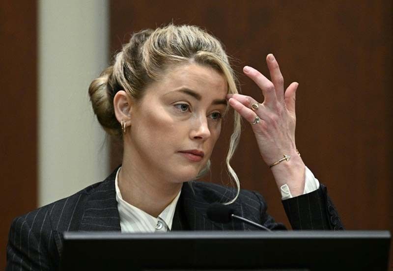 Johnny Depp grabbed Amber Heard by hair, hit her repeatedly — sister