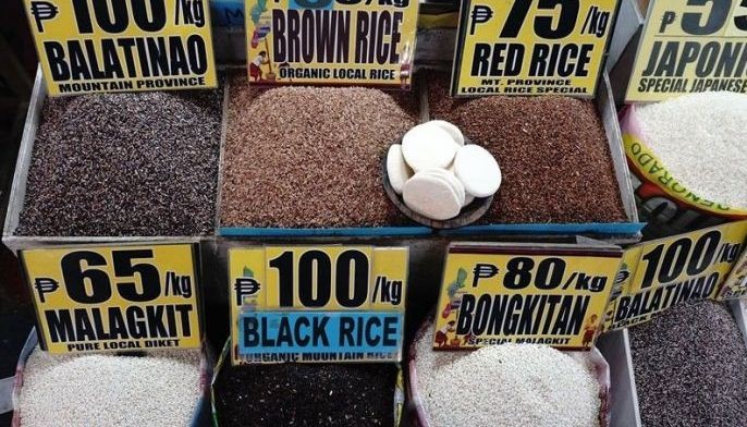 Vendors sell a variety of rice products at the Baguio City Market on Wednesday (May 25, 2022).