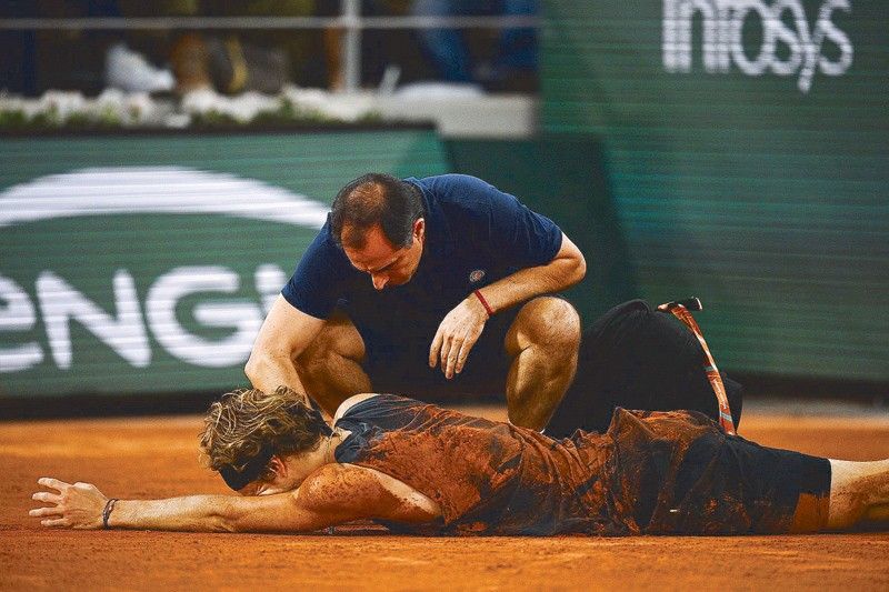 Nadal gains final as Zverev screams in pain