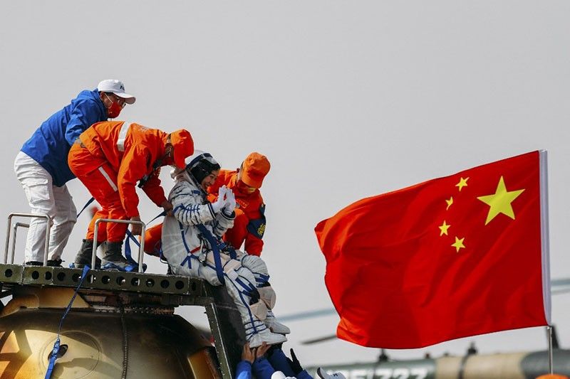 China sends three astronauts to complete space station