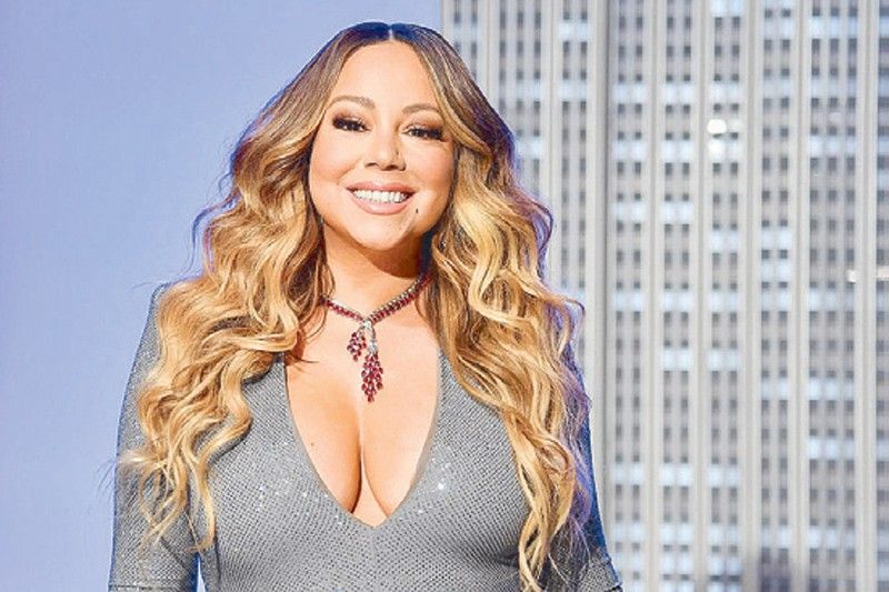 Mariah Carey 'defrosts' in new Christmas video
