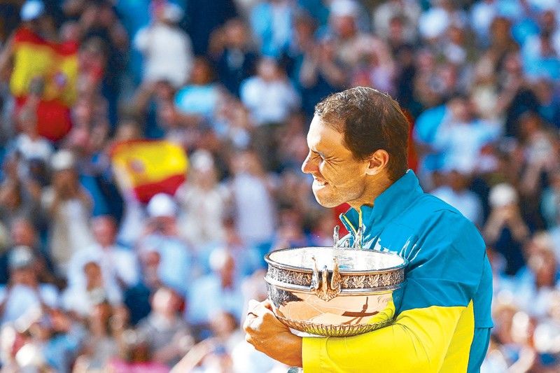 Nadal embraces 22nd Grand Slam title