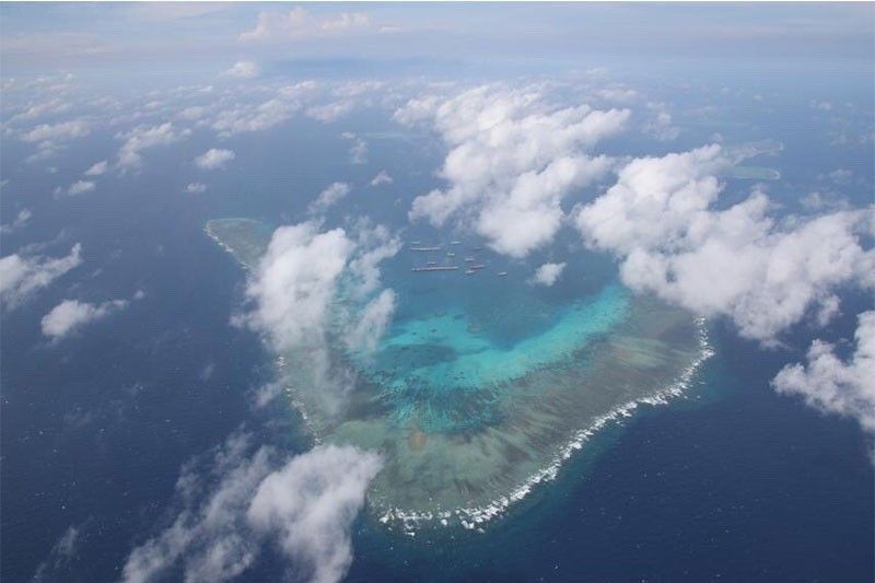 Philippines protests swarm of 100 Chinese vessels in reef