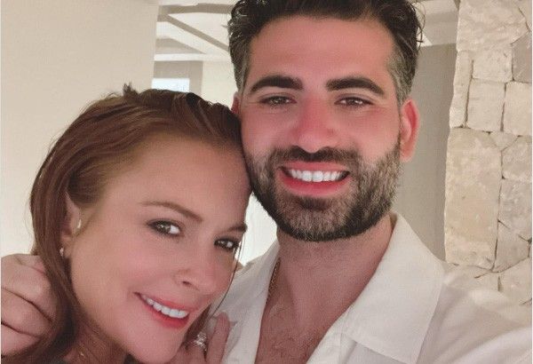 'I'm the luckiest woman': Lindsay Lohan marries banker boyfriend