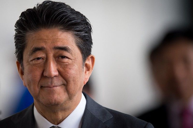 Japan mourns as body of assassinated PM Abe returns to Tokyo