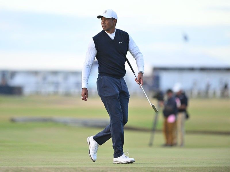 Limping Tiger slumps to six-over on British Open return