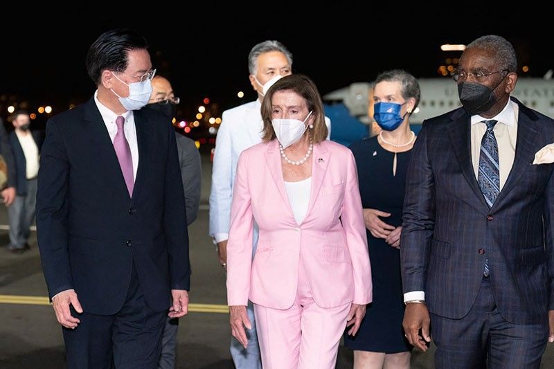 Pelosi lands in Taiwan, defying China threats