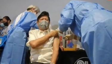 Screengrab from People's Television shows President Ferdinand Marcos Jr. getting his booster shot.