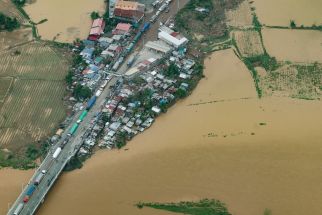 This handout photo taken and released by the Presidential Photographers' Division on September 26, 2022 shows an aerial view of a flooded area in Central Luzon in the aftermath of Typhoon Noru.