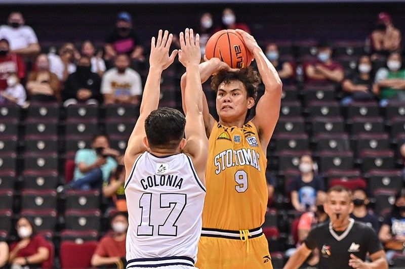 CabaÃ±ero stars as Tigers hunt down Falcons in UAAP opener