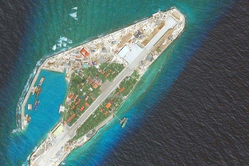 Chinese vessels nagtatayo ng â��artificial islandâ�� sa Spratly