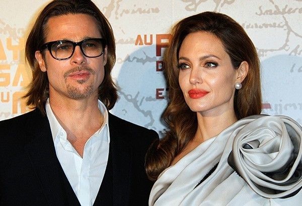 Brad Pitt 'choked' one child, hit another in Angelina Jolie plane fight â�� court papers