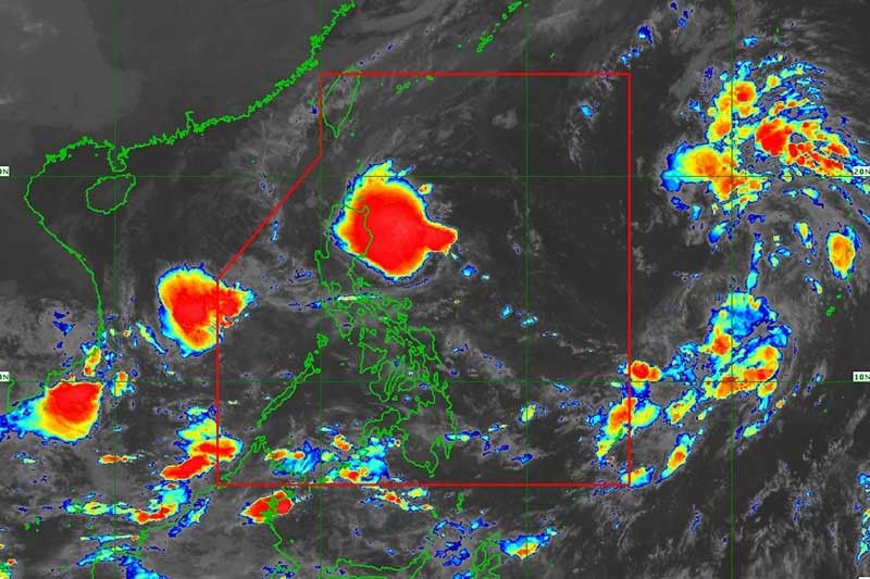 'Maymay' seen to weaken into remnant low as it nears land