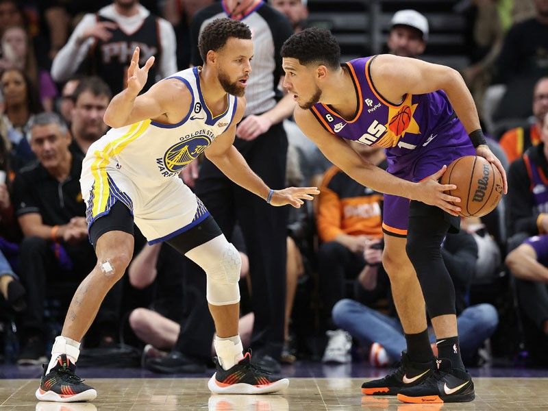 Booker sparks Suns over Warriors as Thompson ejected