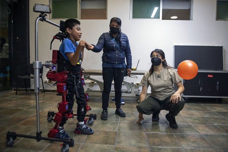 Robotic suit gives paralyzed children gift of walking