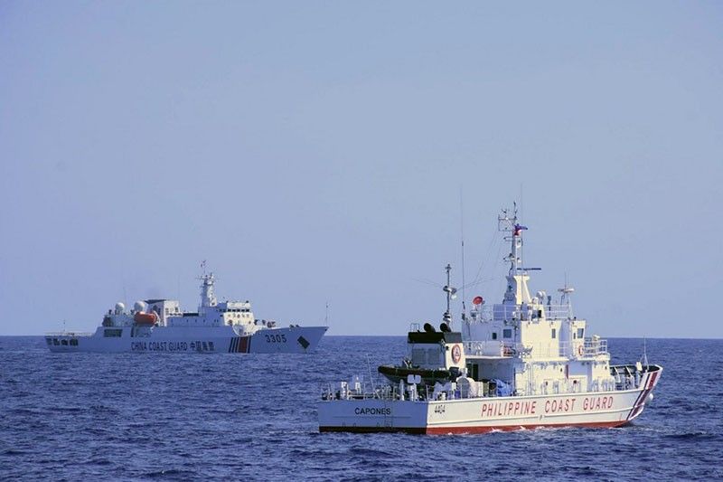 China denies coast guard â��forcefullyâ�� taking rocket debris