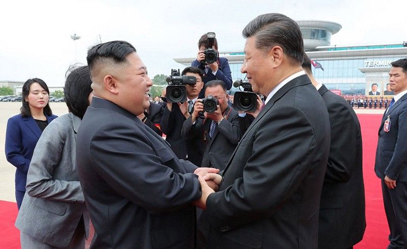 Xi tells Kim: China willing to work with North Korea for 'world peace'